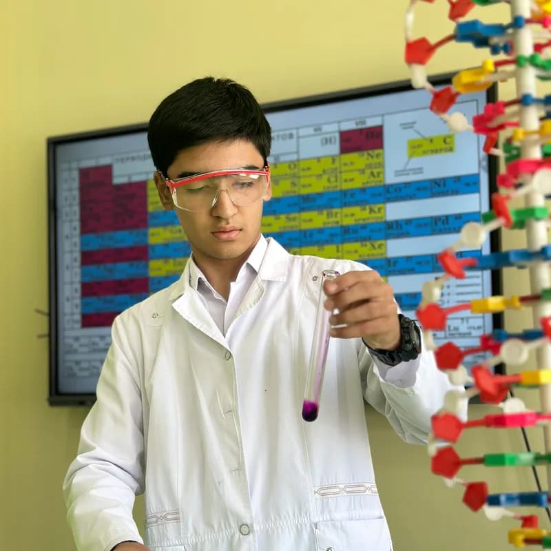 Student in a chemistry lab at Asia Kids School